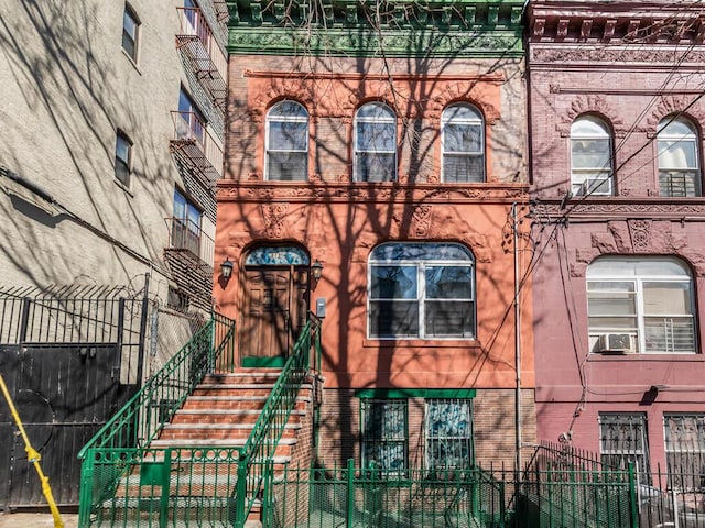 exterior space with a fenced front yard