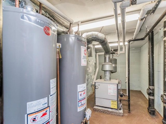 utility room with gas water heater and a heating unit