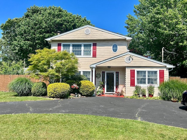 view of front of property with fence