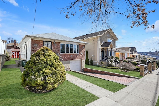 bungalow with brick siding, a residential view, decorative driveway, and a front lawn