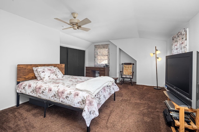 bedroom with lofted ceiling, ceiling fan, and carpet floors