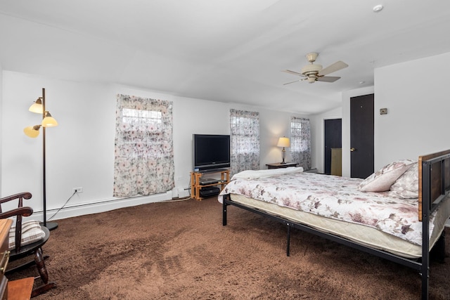 bedroom with ceiling fan, multiple windows, vaulted ceiling, and carpet flooring