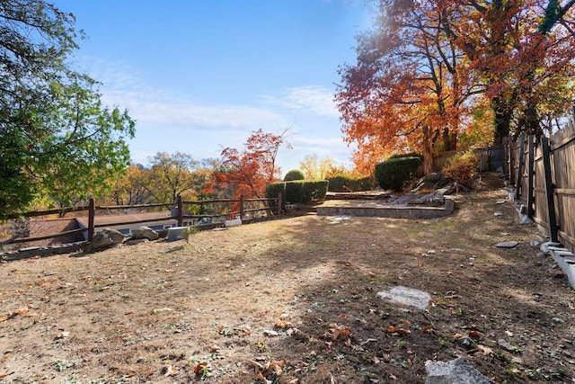 view of yard with fence