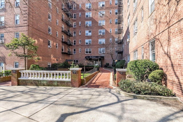 view of home's community with fence