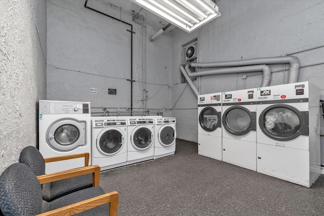 common laundry area with washer and dryer