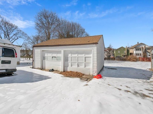 view of snow covered garage