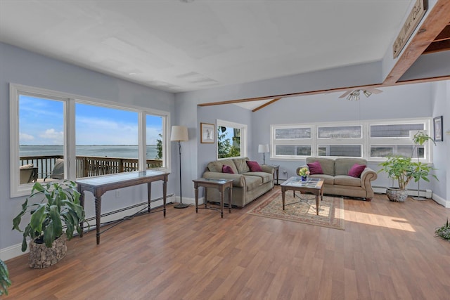 living area with a baseboard heating unit, wood finished floors, baseboards, vaulted ceiling, and baseboard heating