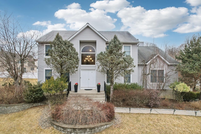 view of front of home featuring a front lawn