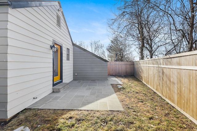 view of yard with a fenced backyard and a patio