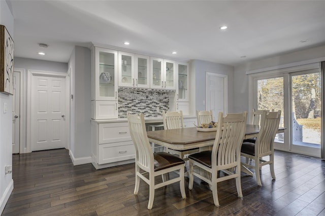 dining room with recessed lighting, dark wood-style flooring, visible vents, and baseboards