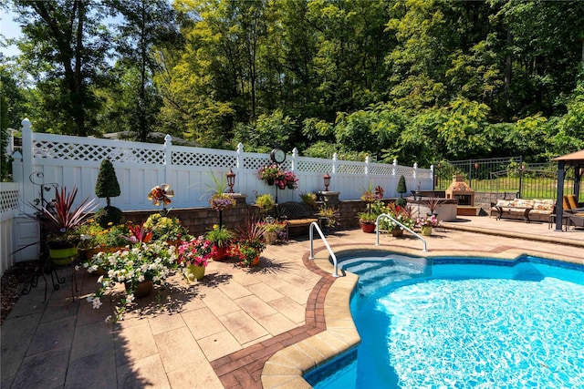 view of pool with fence private yard, a patio area, and a fenced in pool