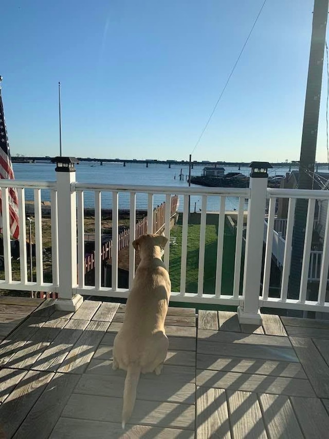 deck featuring a water view