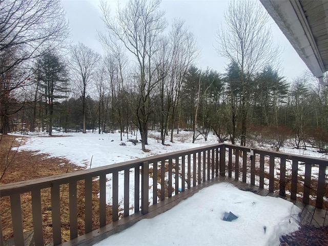 view of snow covered deck