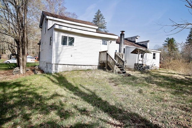 5 Plank Rd, Mongaup Valley, NY 12762 - rear view of house with a lawn