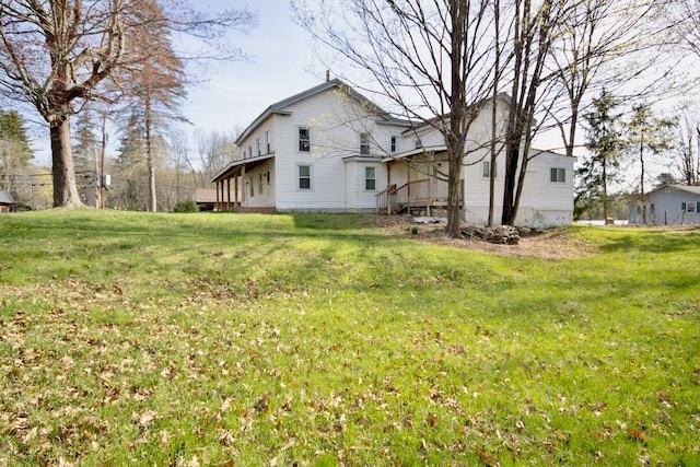 5 Plank Rd, Mongaup Valley, NY 12762 - back of house with a yard
