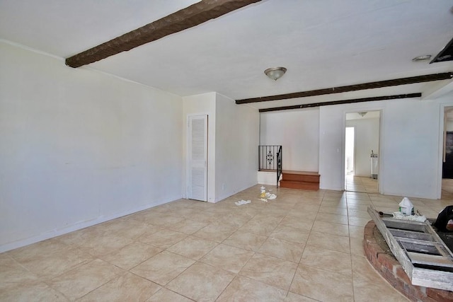 5 Plank Rd, Mongaup Valley, NY 12762 - unfurnished living room with light tile patterned floors and beam ceiling