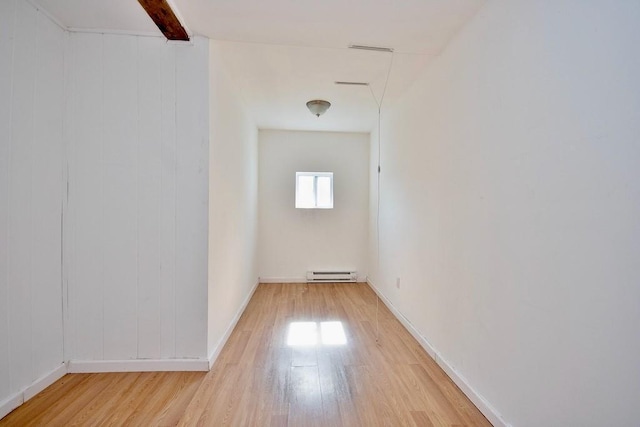 5 Plank Rd, Mongaup Valley, NY 12762 - unfurnished room with baseboards, baseboard heating, and light wood-type flooring