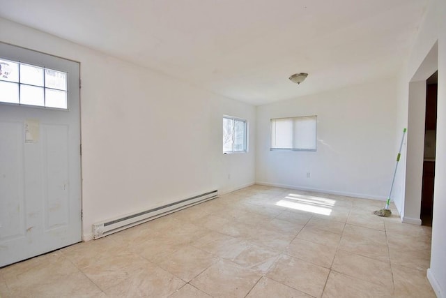 5 Plank Rd, Mongaup Valley, NY 12762 - empty room featuring baseboard heating, baseboards, and light tile patterned floors