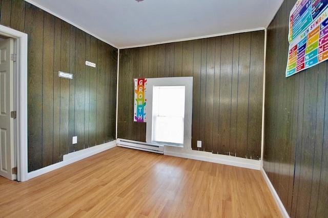 5 Plank Rd, Mongaup Valley, NY 12762 - unfurnished room featuring baseboard heating, wood walls, and wood finished floors