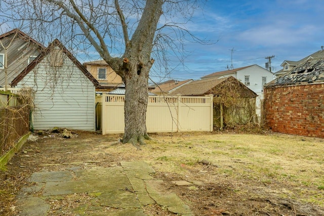 view of yard featuring fence