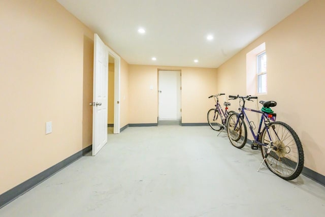 interior space with recessed lighting and baseboards