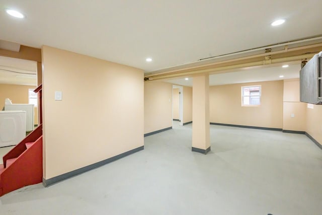 below grade area featuring recessed lighting, stairway, and baseboards