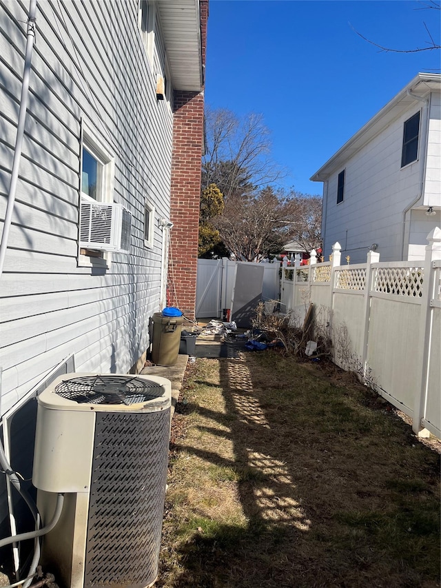 view of yard featuring a fenced backyard and cooling unit