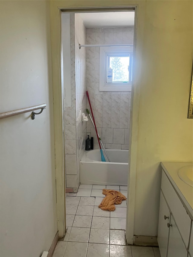 full bath featuring shower / bath combination, tile patterned floors, and vanity