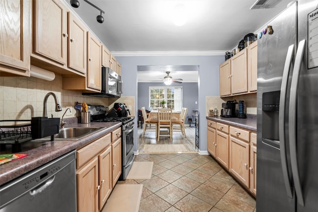 kitchen featuring backsplash, appliances with stainless steel finishes, ornamental molding, light brown cabinets, and a sink