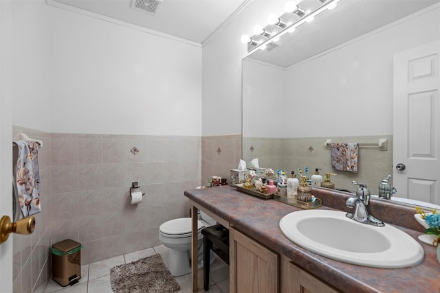 bathroom with tile patterned flooring, visible vents, tile walls, and toilet