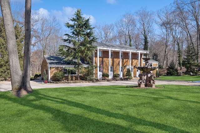 exterior space featuring a lawn