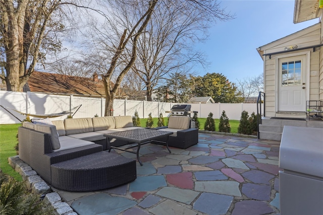 view of patio / terrace with a fenced backyard and an outdoor living space