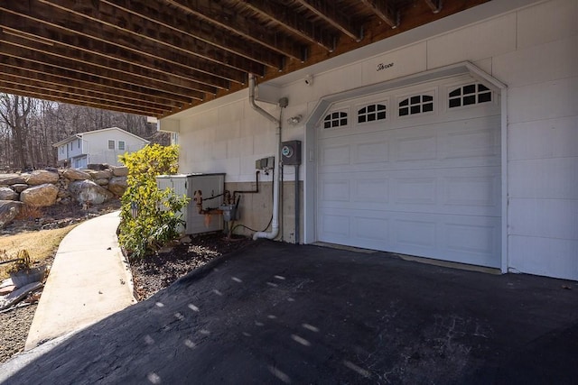 garage with driveway