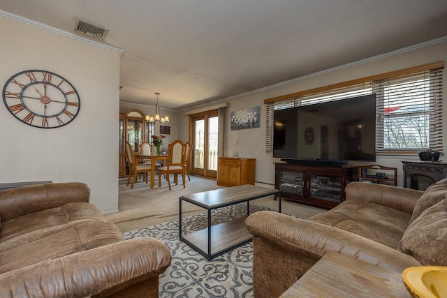 living area featuring a notable chandelier, visible vents, light colored carpet, and ornamental molding