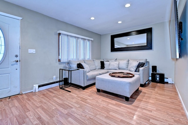 living area featuring a baseboard radiator, recessed lighting, baseboards, baseboard heating, and light wood-type flooring