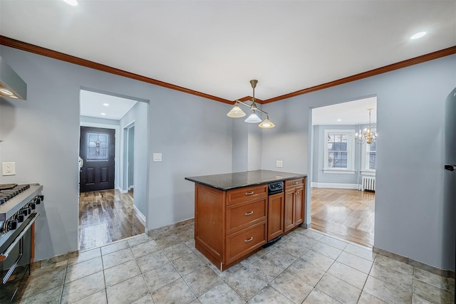 kitchen with crown molding, radiator, light tile patterned flooring, and plenty of natural light