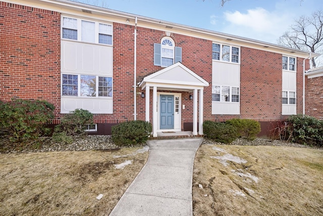 multi unit property featuring brick siding