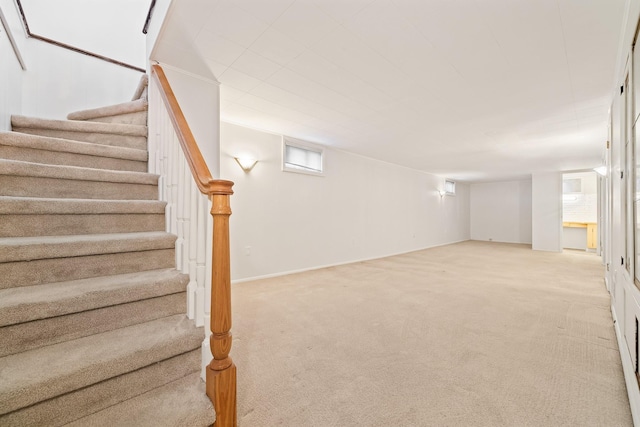 below grade area with carpet floors and stairs