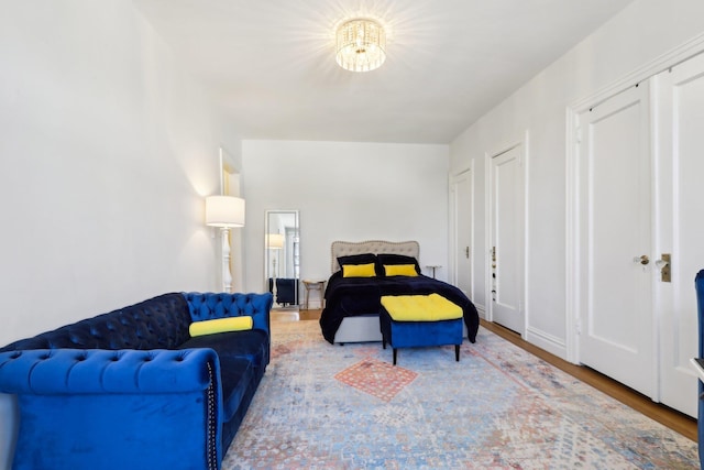 bedroom with wood finished floors