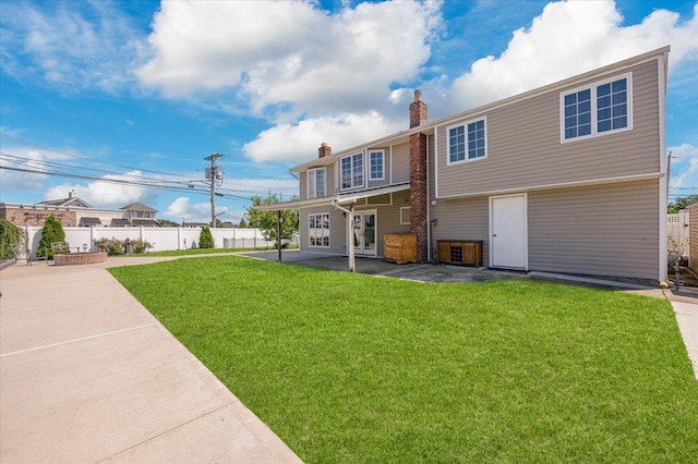 101 Jetmore Pl, Massapequa, NY 11758 - back of house featuring a lawn, fence, a chimney, and a patio area
