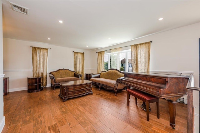 101 Jetmore Pl, Massapequa, NY 11758 - living area with visible vents, recessed lighting, and wood-type flooring