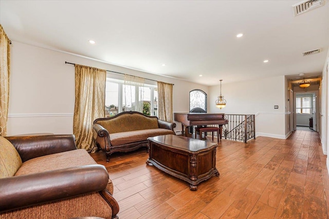 101 Jetmore Pl, Massapequa, NY 11758 - living room featuring visible vents, recessed lighting, baseboards, and wood finished floors