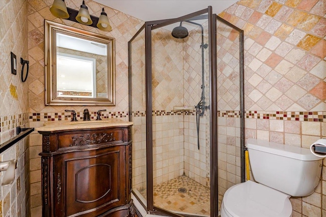 101 Jetmore Pl, Massapequa, NY 11758 - full bathroom featuring vanity, tile walls, a shower stall, and toilet