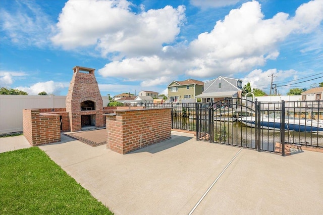 101 Jetmore Pl, Massapequa, NY 11758 - view of patio / terrace featuring fence and a fireplace