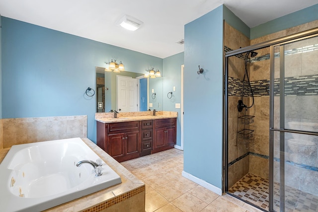 full bathroom with tile patterned flooring, a shower stall, a tub with jets, and a sink