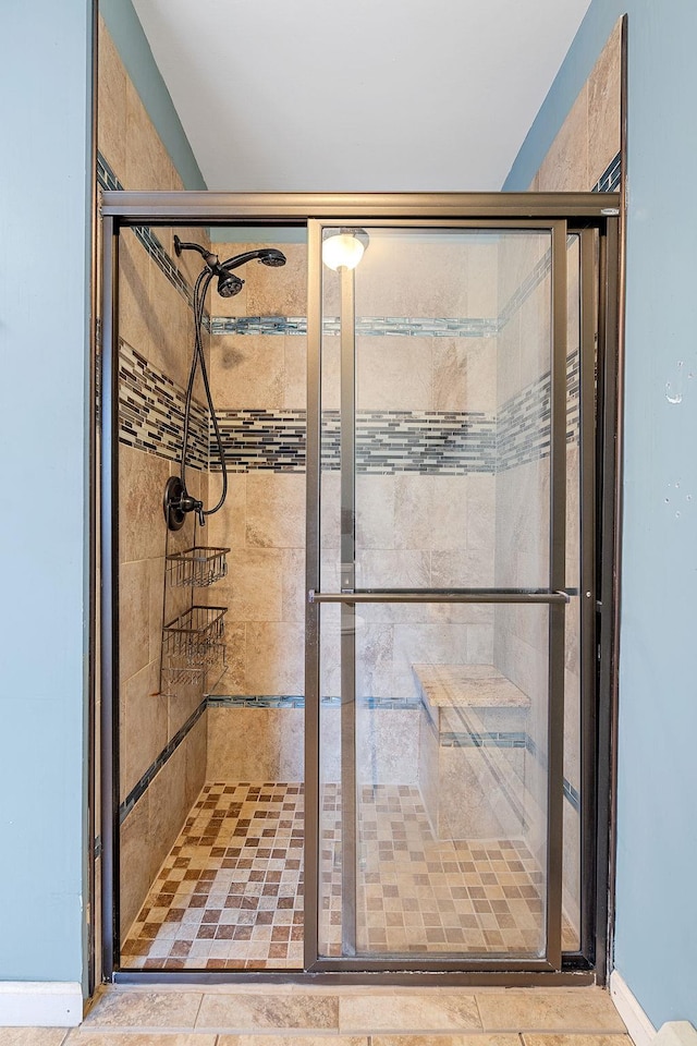full bathroom featuring a stall shower