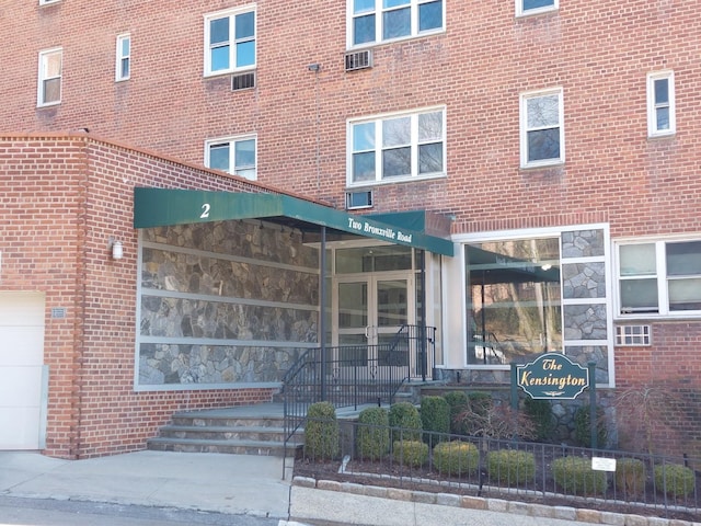 view of property with fence