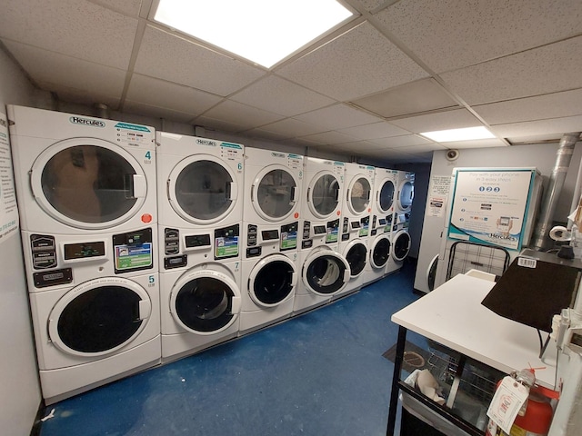 shared laundry area with stacked washer and clothes dryer and washer and clothes dryer