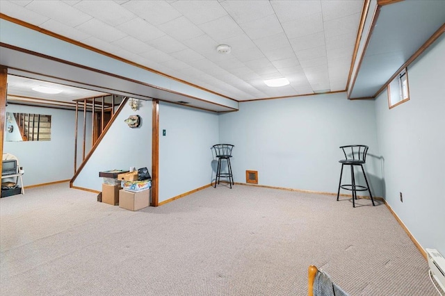 basement with carpet flooring and baseboards