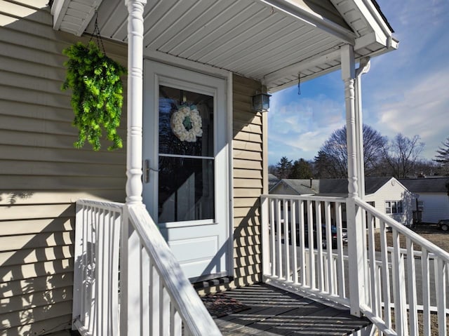 doorway to property featuring covered porch